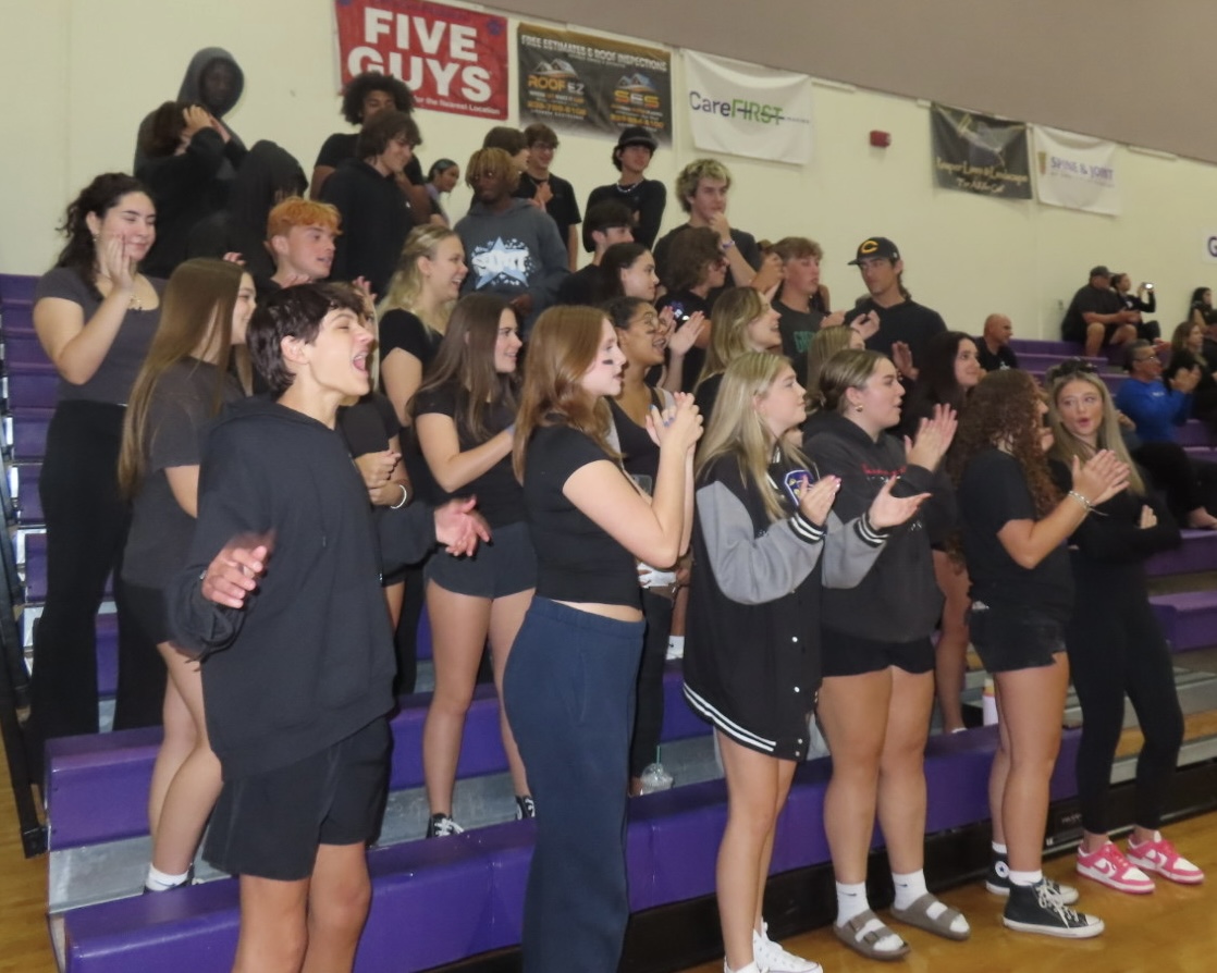 The "Panther Pack" cheers on the Lady Panther.