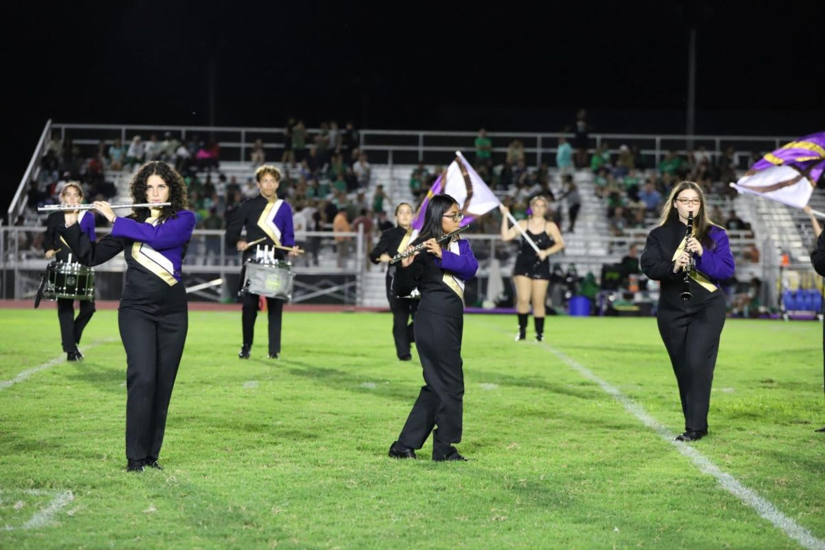 Gabriela Martinez Diaz, Jasmine Casarrubias-Cano, and Isabella Quesenberry perform in front of an excited home crowd
