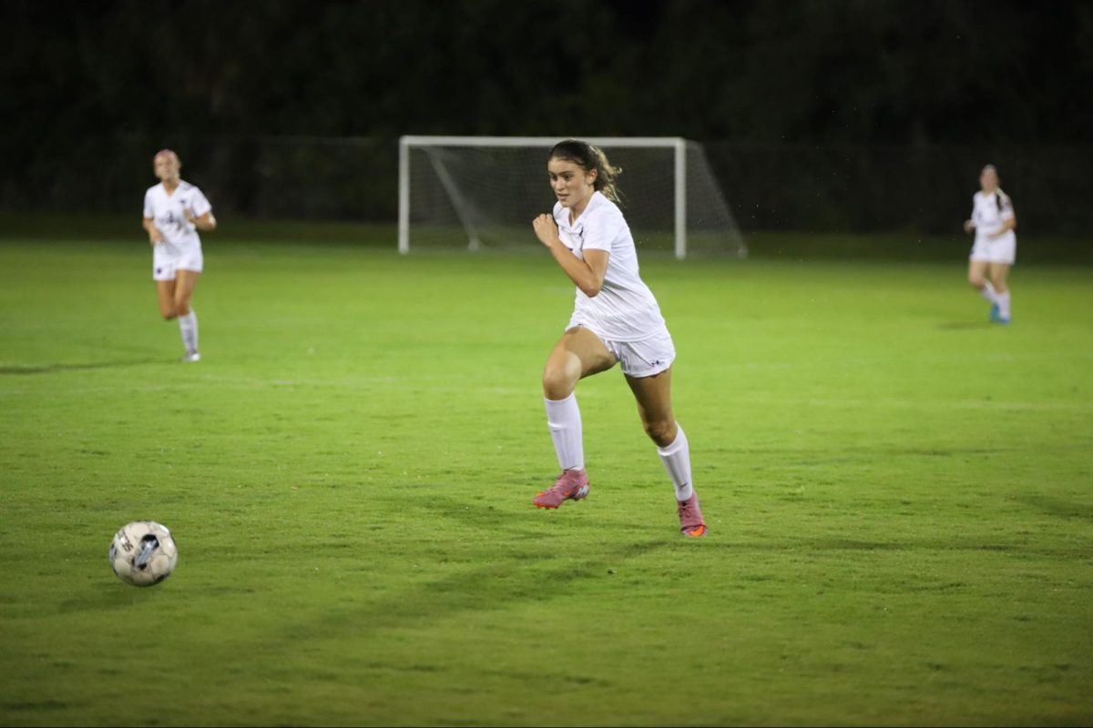 Sophomore Emily Desmond on the pitch