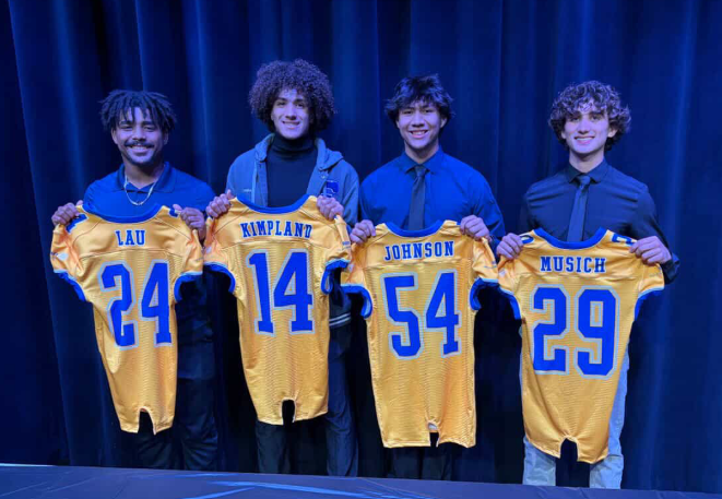 Kimpland, Johnson, and Musich pose with their all star jerseys along with Micheal Lau, an current player at Estero Highschool who got his start at Cypress and has since stayed close friends with many players. 
